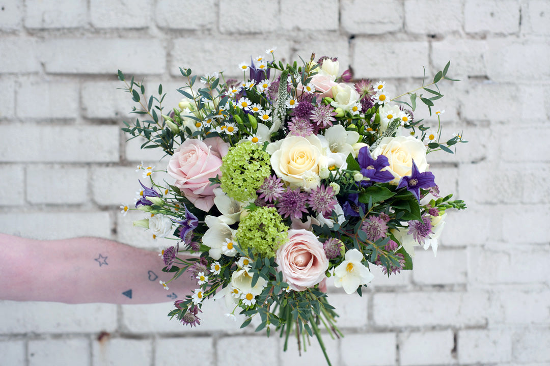 A bouquet of flowers in pastel shades